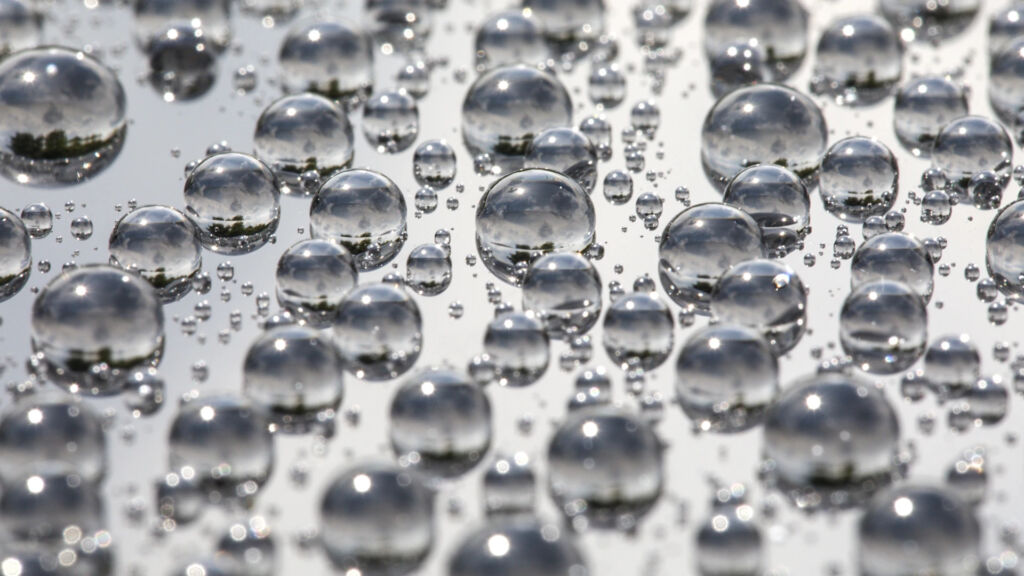 water beading on a ceramic coated car painted surface
