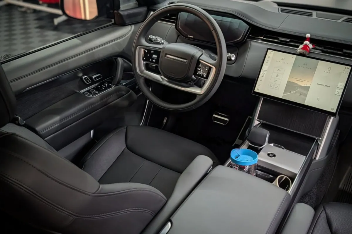 Detailed luxury car interior with clean seats and dashboard.